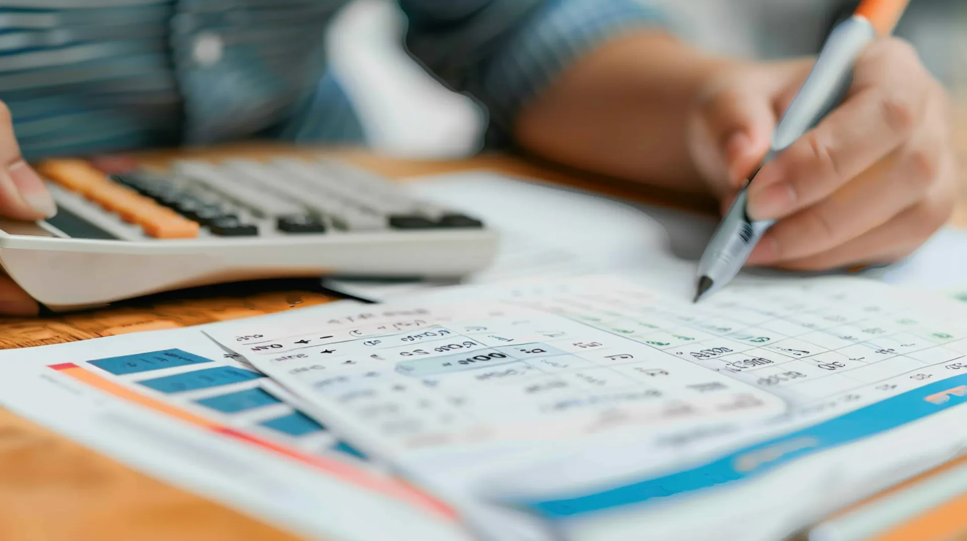 A magnifying glass inspecting legal documents related to Dubai property taxes for investors